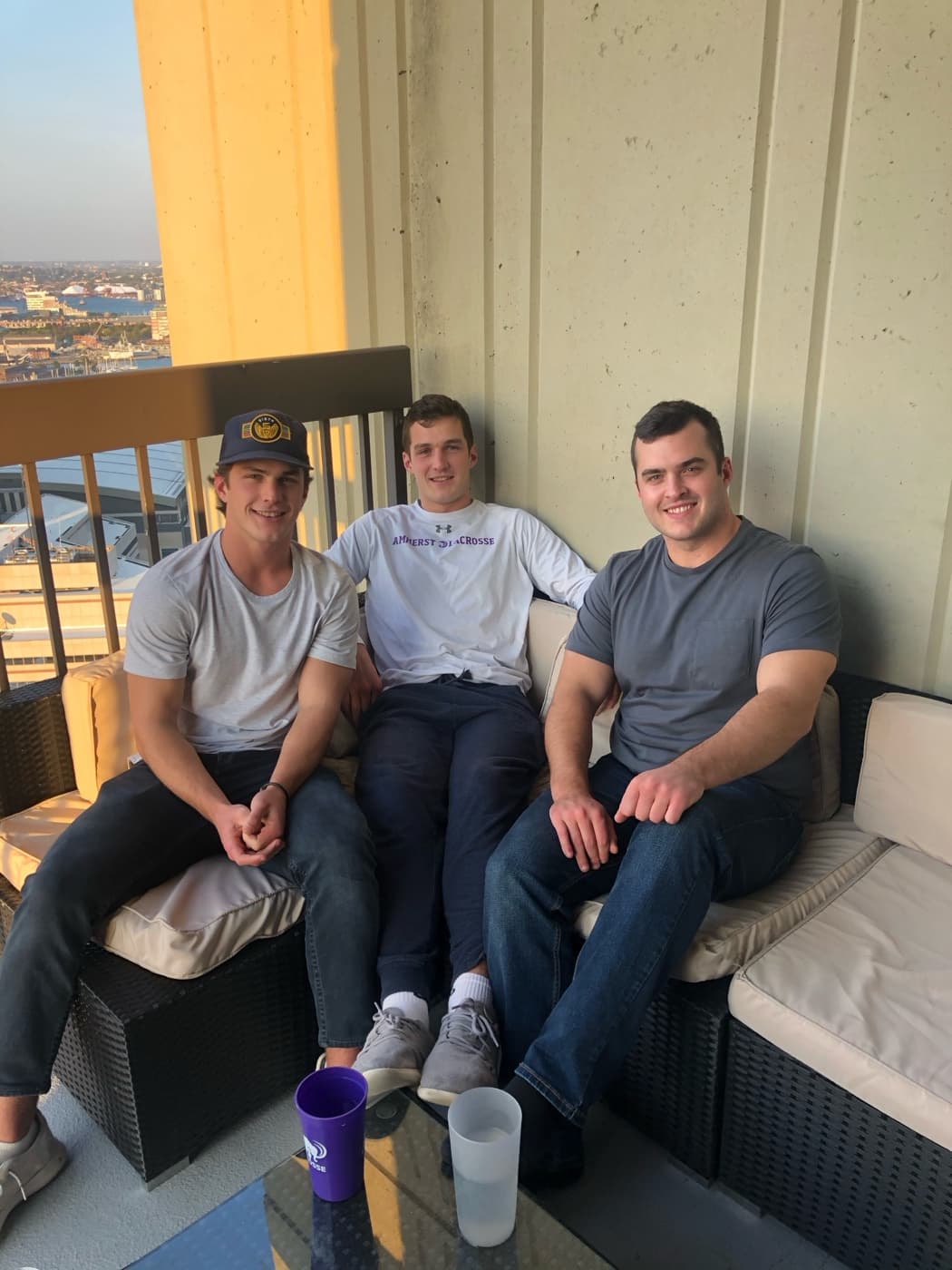 Drew with friends on a rooftop in Boston