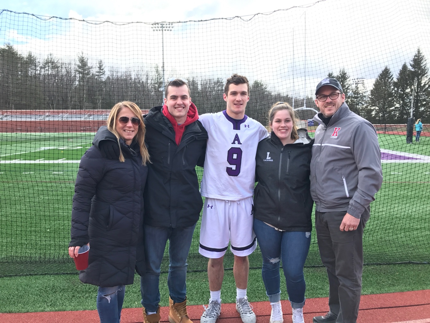 Drew with his family at Amherst College on senior day