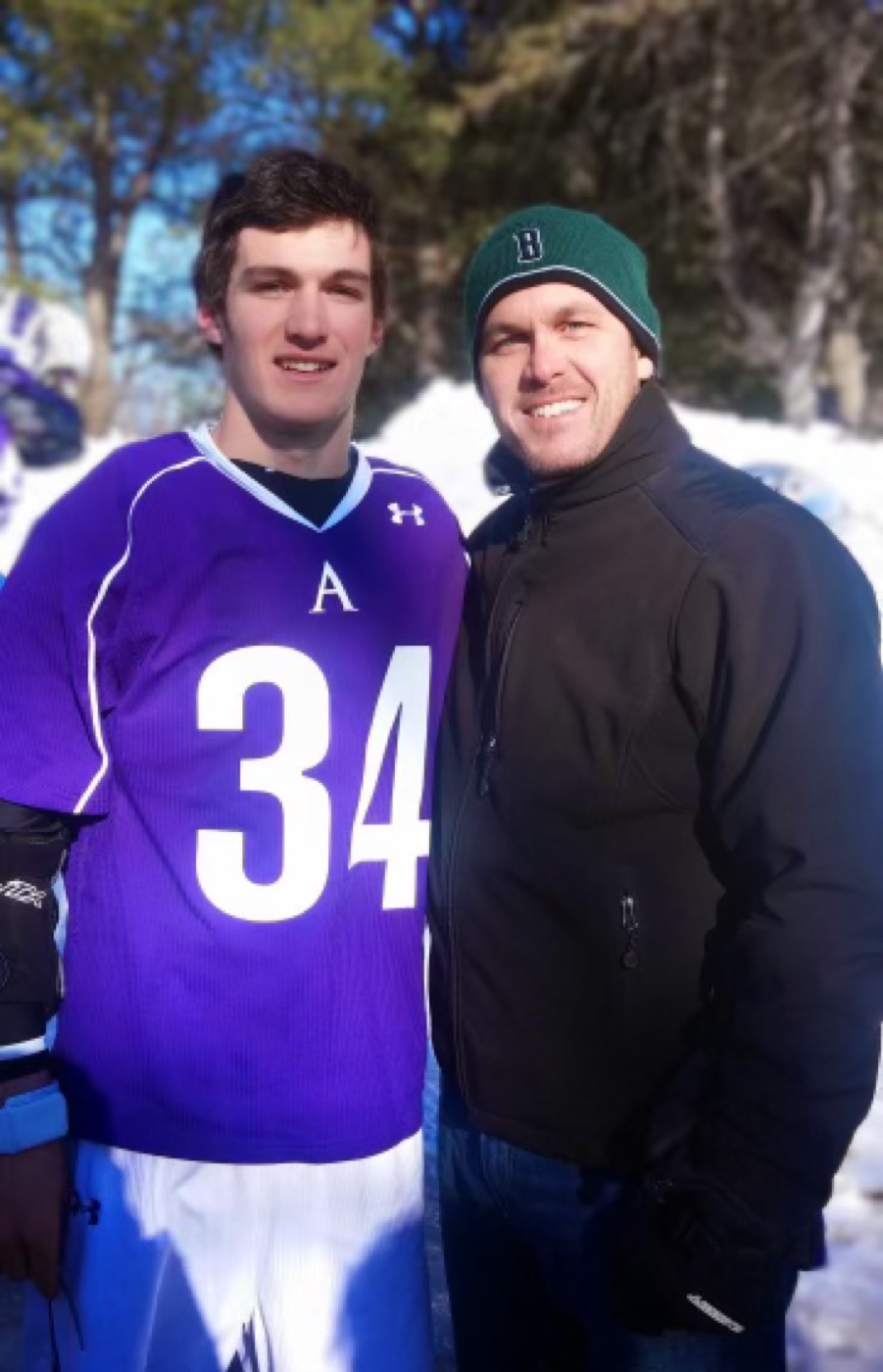 Drew in his Amherst College lacrosse jersey